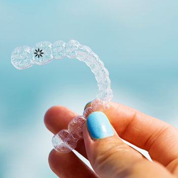 Photo with invisalign aligner