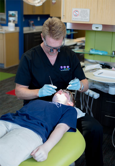 Dr. Pilipovich with patient - Pediatric Dentist and orthodontist in Terre Haute, IN